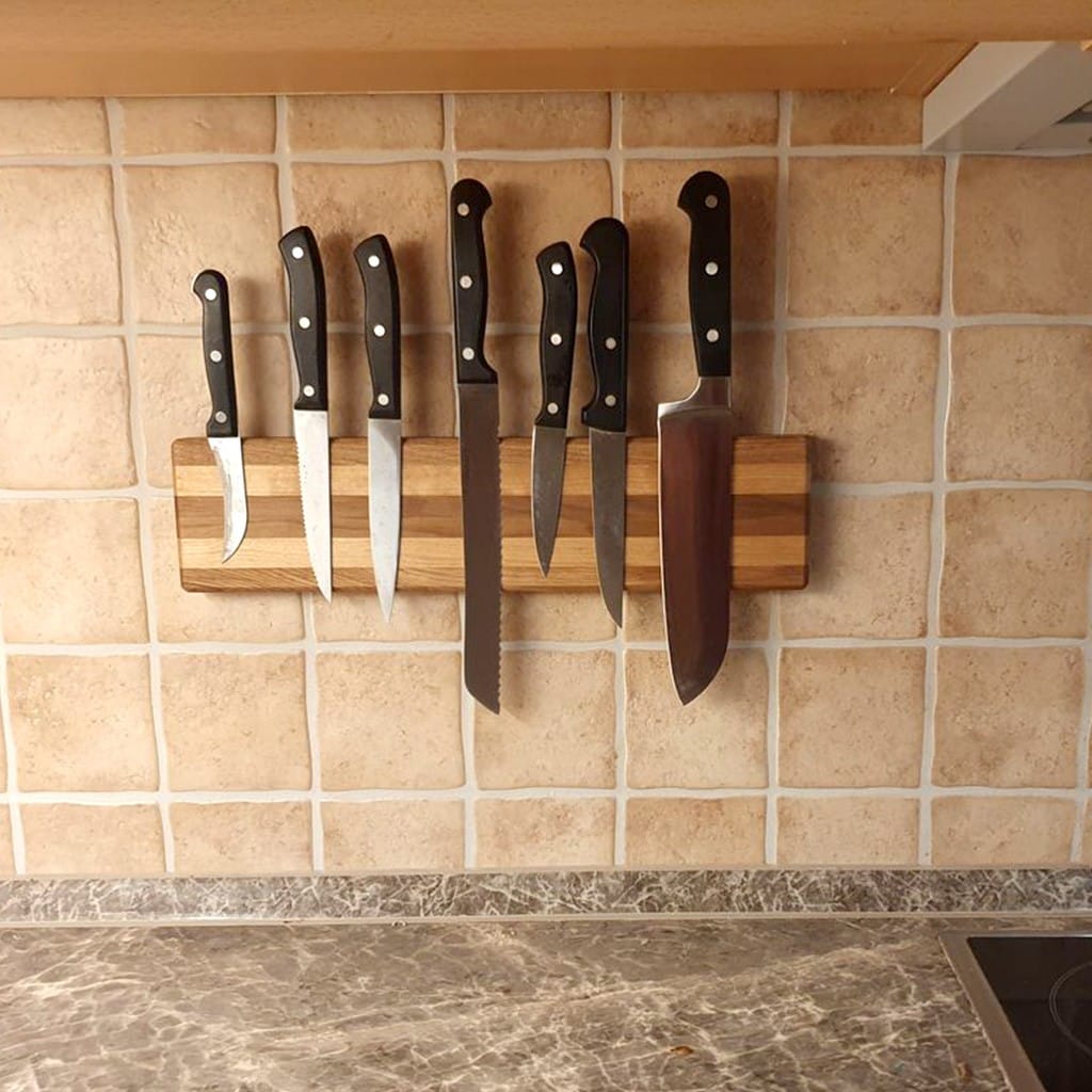 A magnetic knife rail made from solid oak, birch and walnut