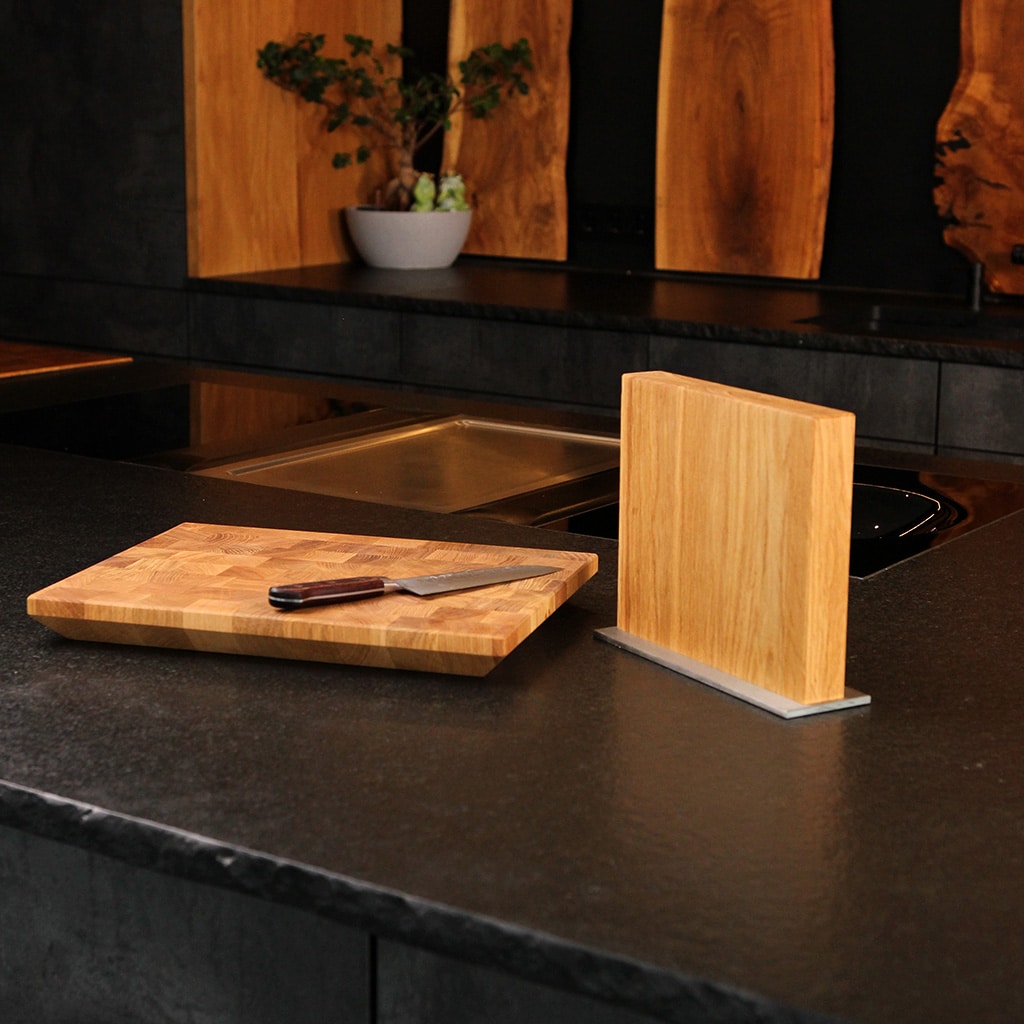 A magnetic knife block made from solid oak